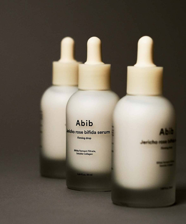 ABIB  Resurrection Bifida Serum Firming Drops 50ml, bouteilles Abib sur fond sombre, gouttes sérum raffermissant