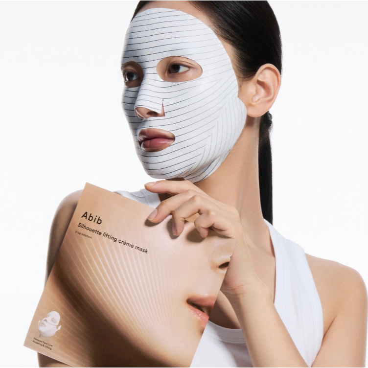 ABIB Silhouette Lifting Cream Mask V-Up Solution : masque visage anti-âge, femme en pose, packaging Abib sur fond blanc