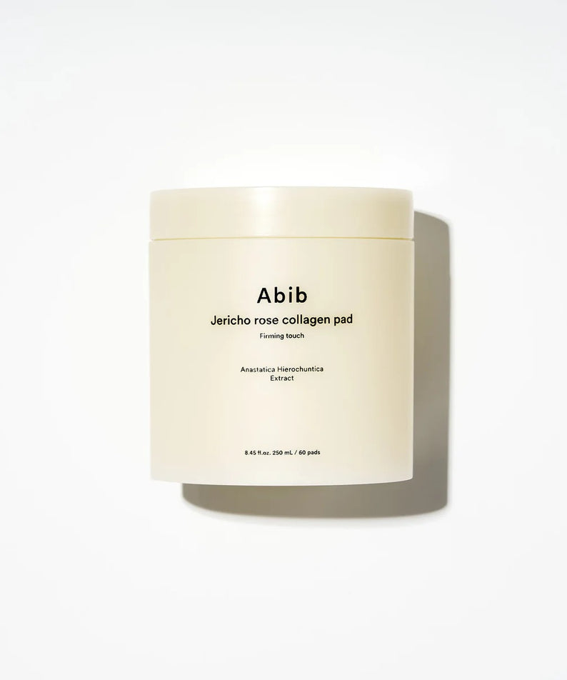 Pot de 60 pads de soin raffermissant ABIB Jericho Rose Collagen Pad Firming Touch sur fond blanc.