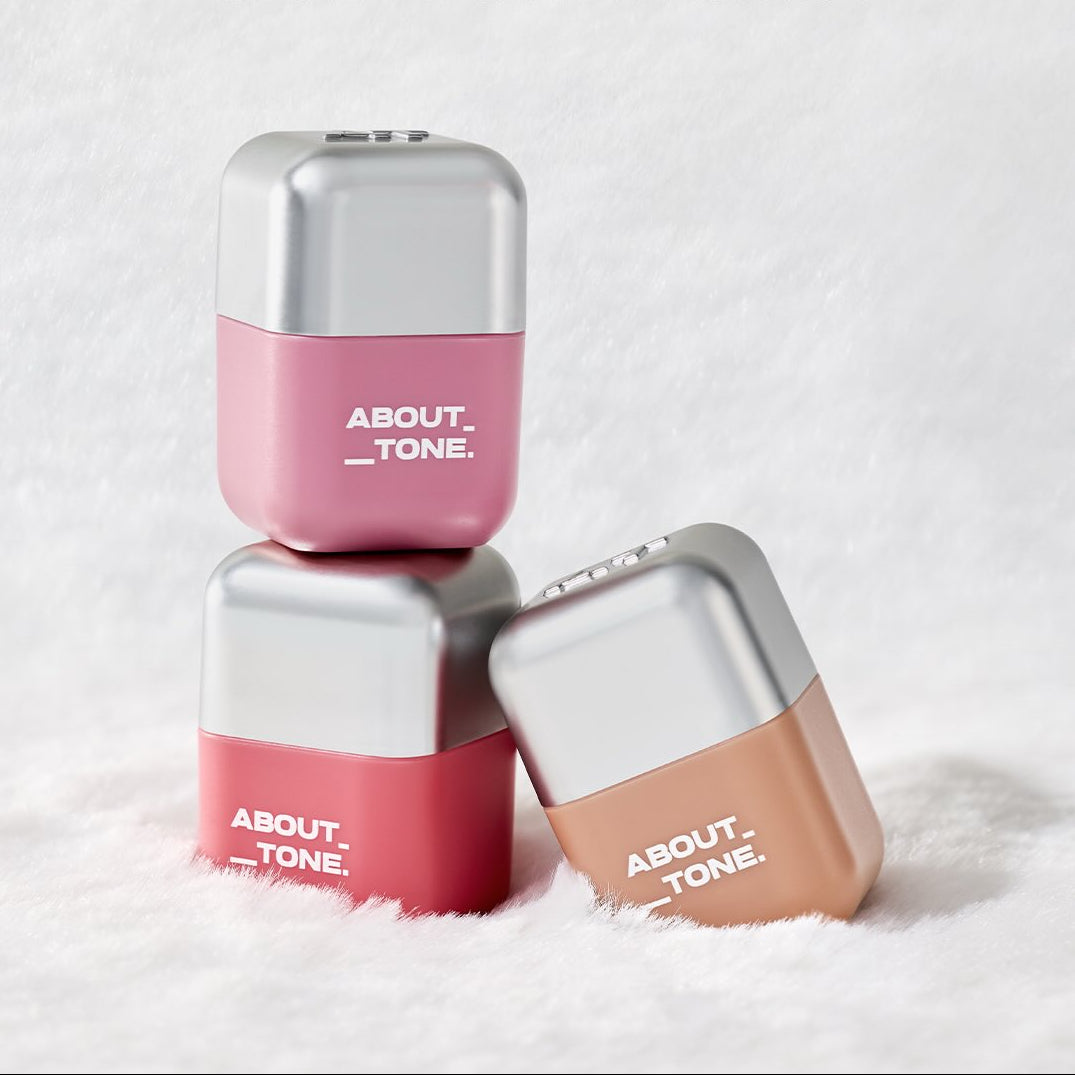 ABOUT TONE Blur Fit Tint Mini 2.3g de la marque ABOUT TONE, flacons roses et nude sur fond blanc, photo produit.