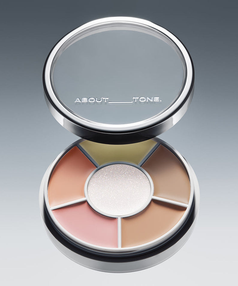 Palette de maquillage "ABOUT TONE Designing Multi Palette 6.5g", couleurs variées, design élégant, produit cosmétique.