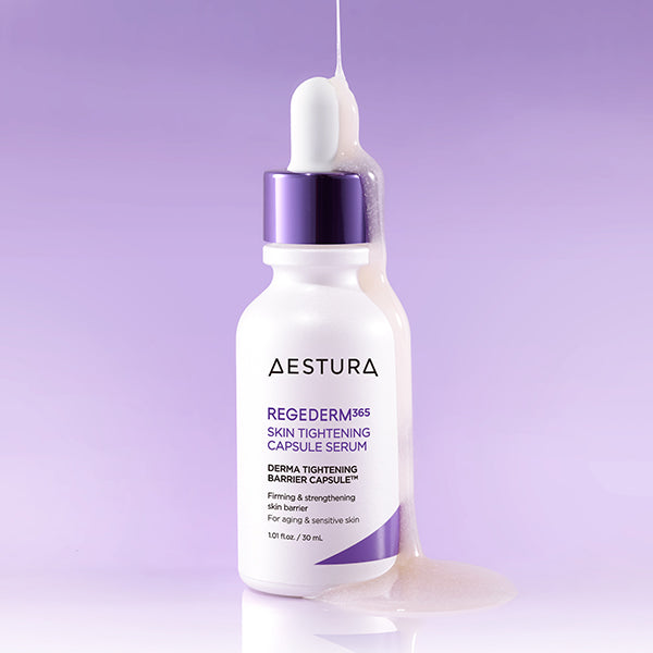 AESTURA Regederm365 Skin Tightening Capsule Serum 30ml : sérum flacon blanc et compte-gouttes sur fond violet