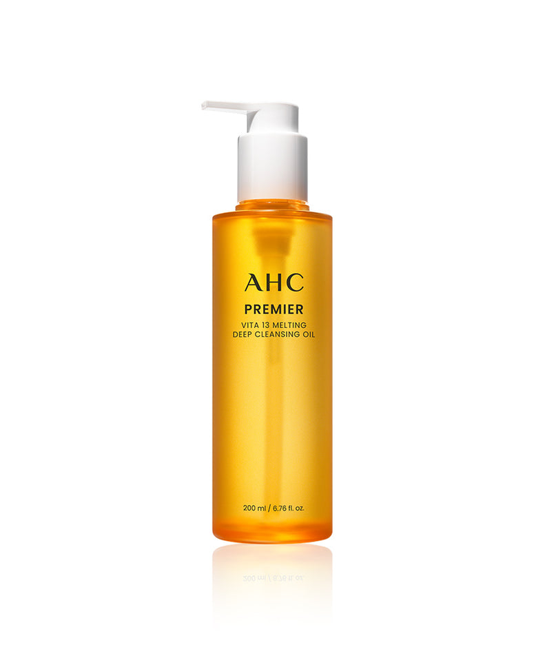 AHC Premier Vita 13 Melting Cleansing Oil 200ml, flacon pompe orange sur fond blanc, présentation produit AHC.