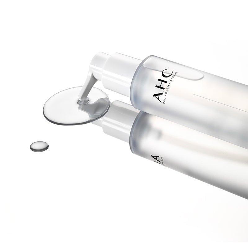 AHC Prep Reset Cleansing Oil 125ml : flacon AHC sur fond blanc, texture huile déversée, contexte cosmétique visage.