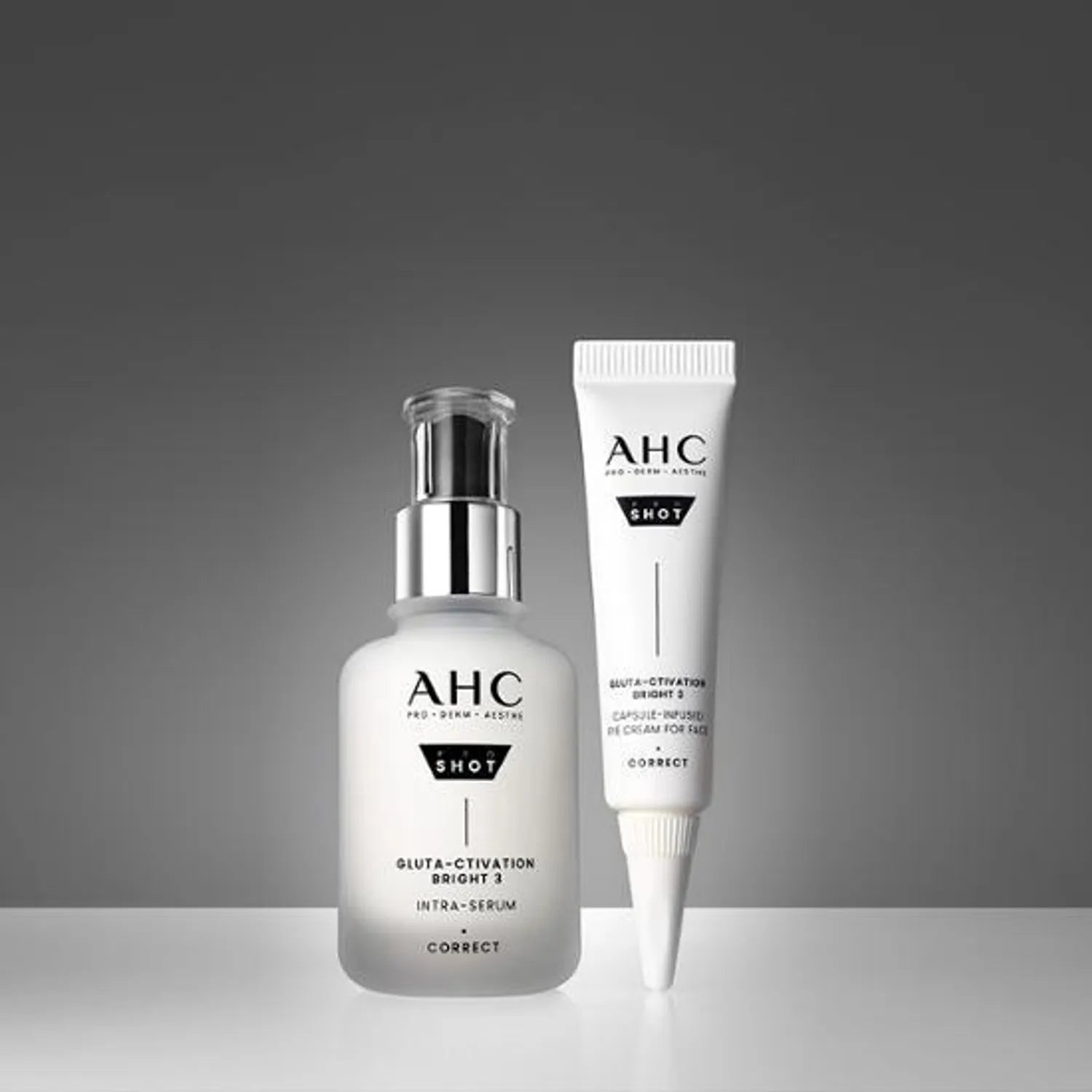 AHC Pro Shot Gluta Activation Bright 3 Intra Serum 40ml AHC sur fond gris, flacon et tube de sérum