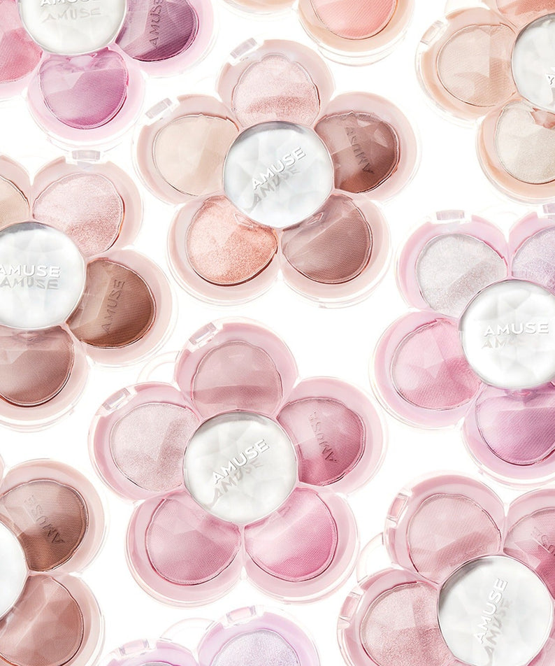 Palette d'ombres à paupières AMUSE Flora avec teintes florales pastel en forme de fleurs, vue multiple pour maquillage élégant.