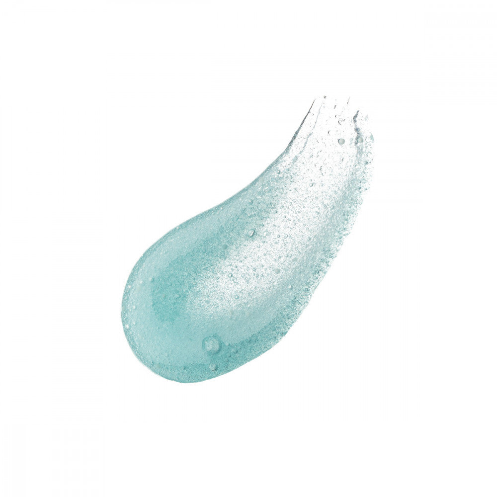 ANILLO Shower Time Body Scrub 210g : gommage bleu en goutte sous la douche, marque ANILLO sur fond blanc.