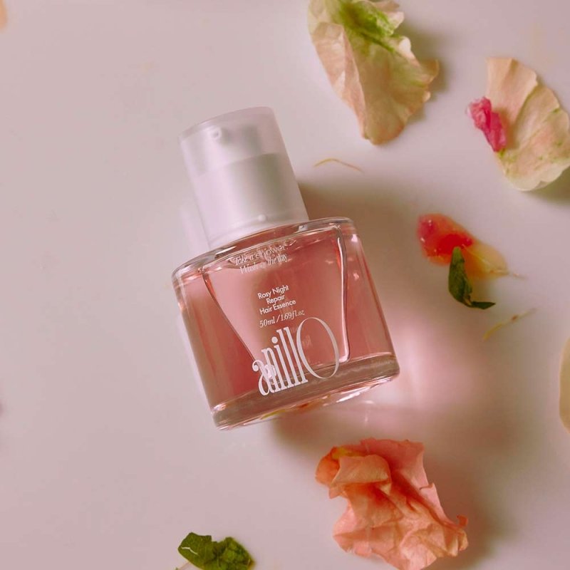ANILLO Rosy Night Repair Hair Essence 50ml : flacon sur fond rose avec pétales, ambiance beauté nuit réparatrice