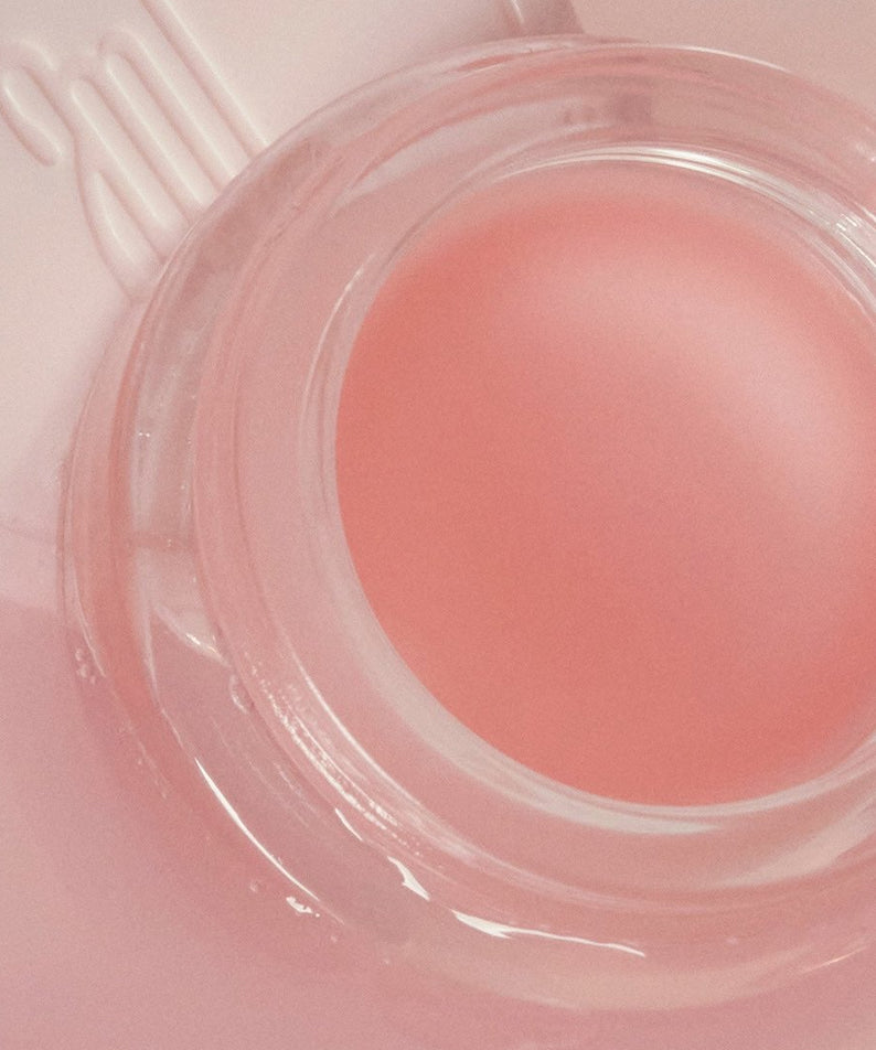 Baume ANILLO Mellow Glow Balm rose doux, hydratant et lumineux pour une peau éclatante.