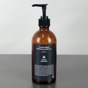 ANNA HOLTZ For Men Double Effect Whitening Emulsion 300ml, flacon pompe sur fond clair, marque ANNA HOLTZ visible.