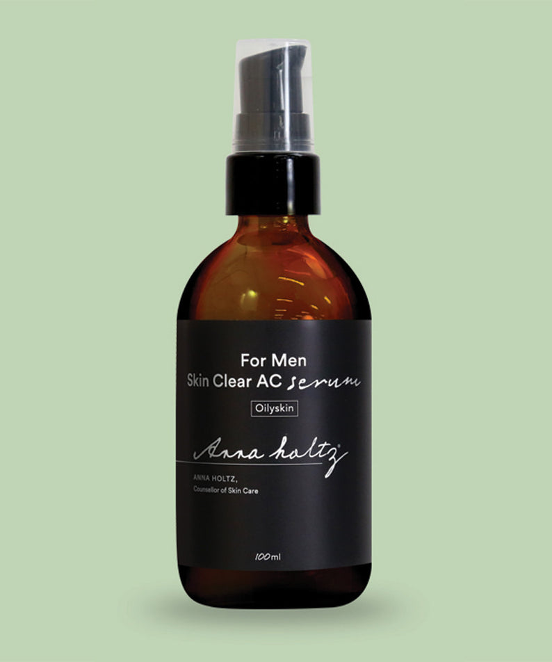 ANNA HOLTZ For Men Homme Men's Skin Clear Serum Essence 100ml : flacon sérum homme sur fond vert, vue produit.