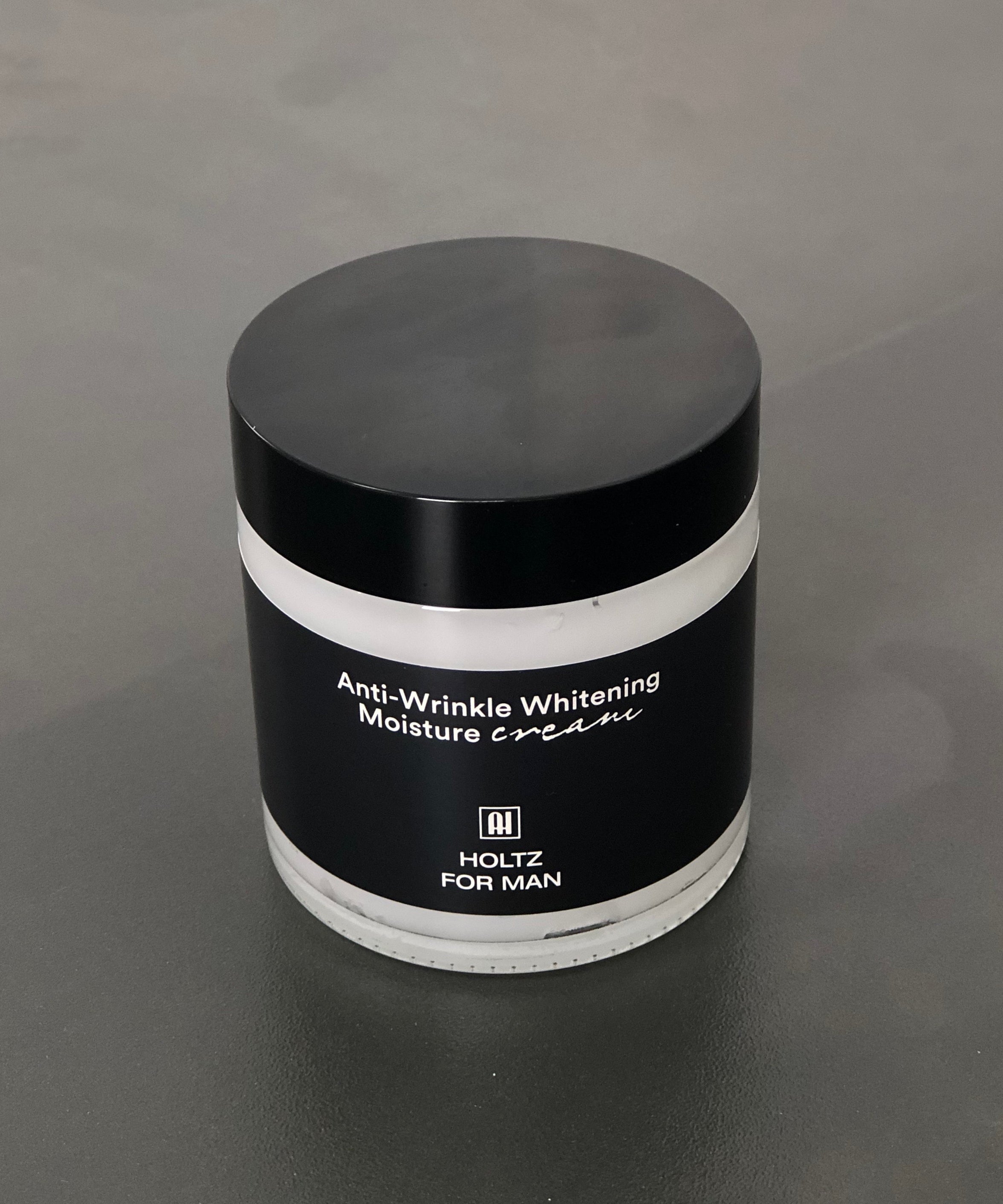 ANNA HOLTZ For Men Homme Snail Wrinkle Improving Whitening Moistureizing Cream 100ml, pot noir sur fond uni, marque HOLTZ FOR MAN