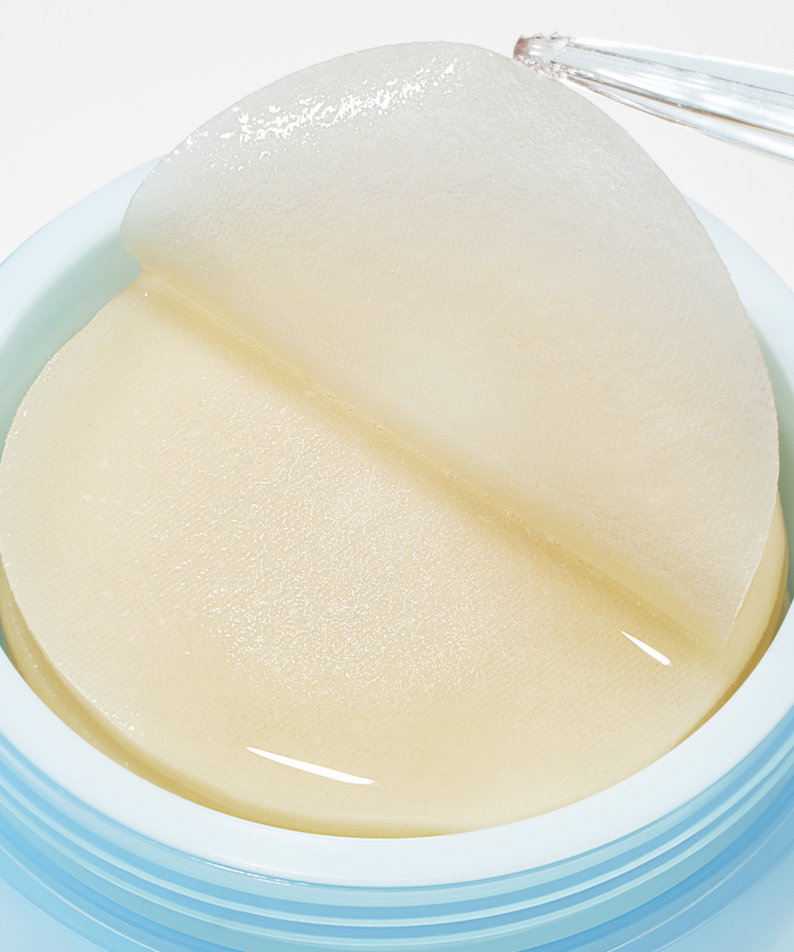 Disques ANUA 8 Hyaluronic Acid Catechin Calming Pads 110 Pads dans un récipient bleu