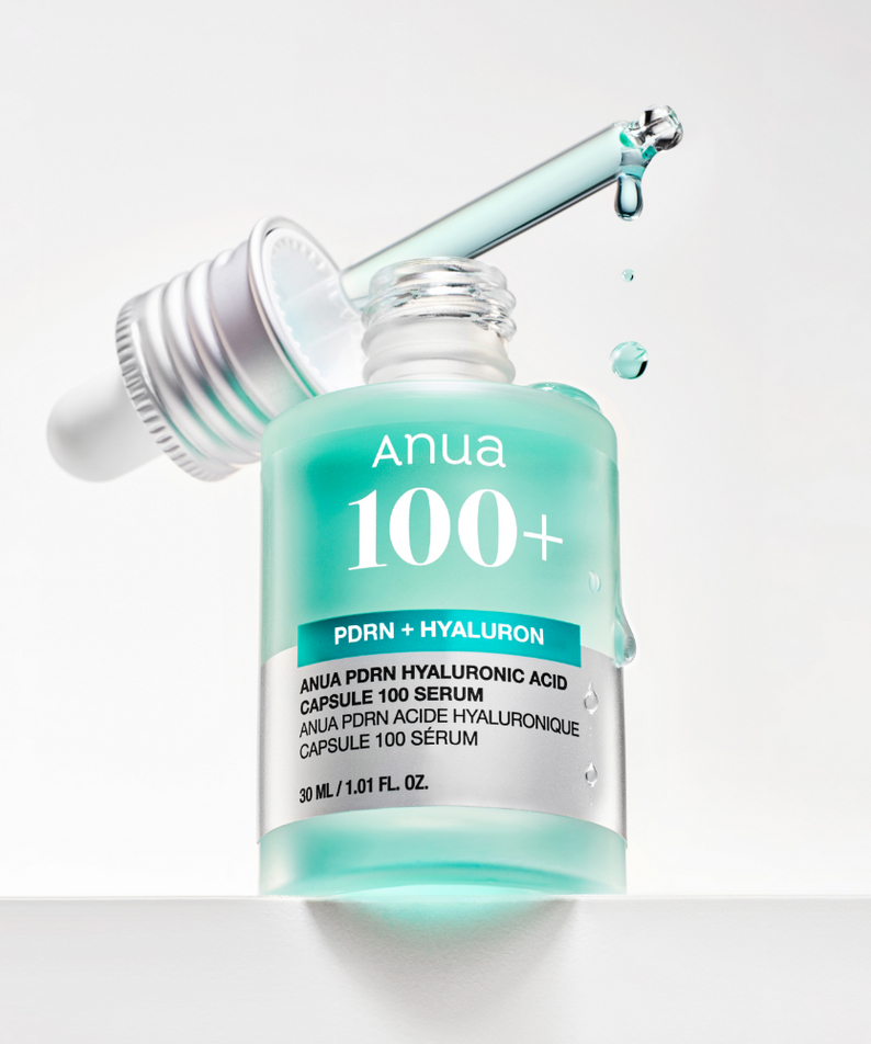 ANUA PDRN + Hyaluronic Acid Capsule 100 Serum 30ml, flacon ANUA avec éclaboussures d’eau, fond blanc.