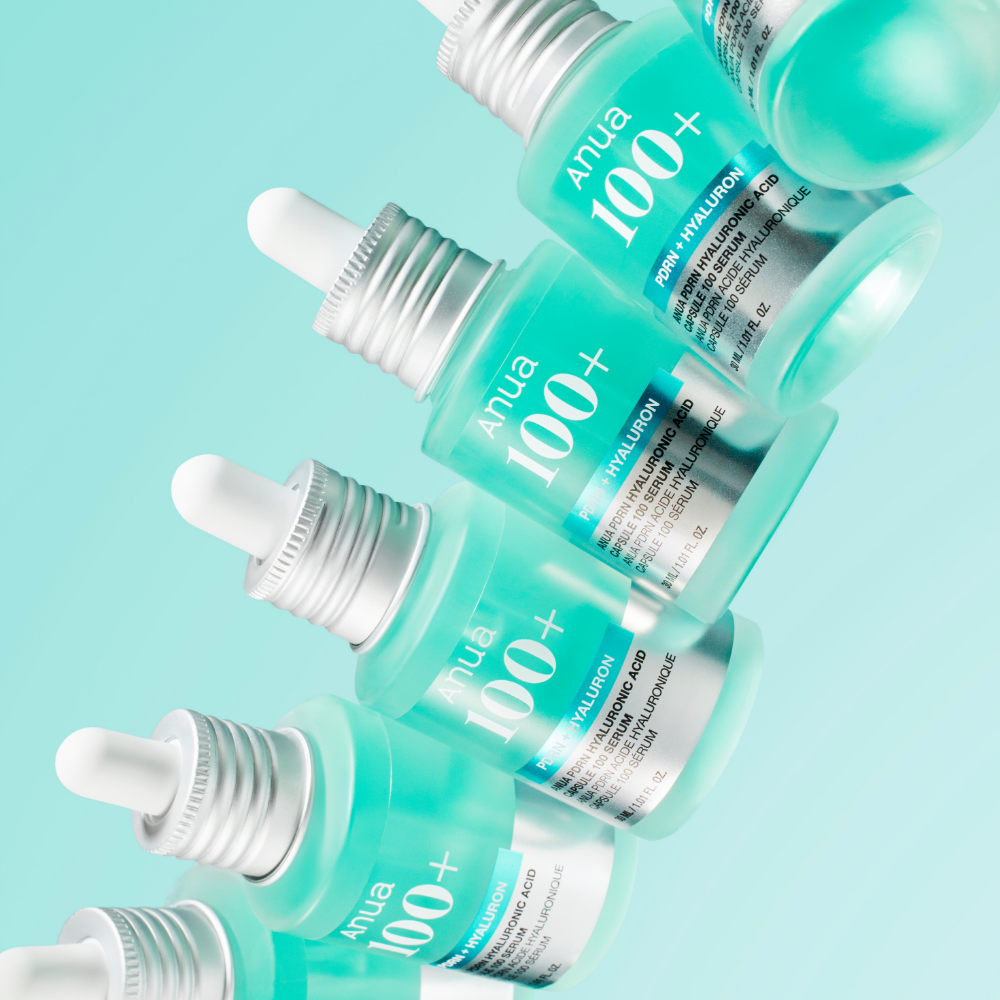 ANUA PDRN + Hyaluronic Acid Capsule 100 Serum 30ml : bouteilles turquoise sur fond bleu, photo produit Anua