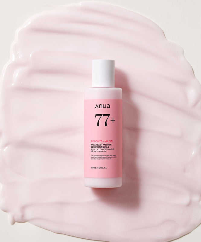 ANUA Peach 77 + Niacin Conditioning Milk 150ml de la marque ANUA, flacon sur fond crème rose, texture douce visible