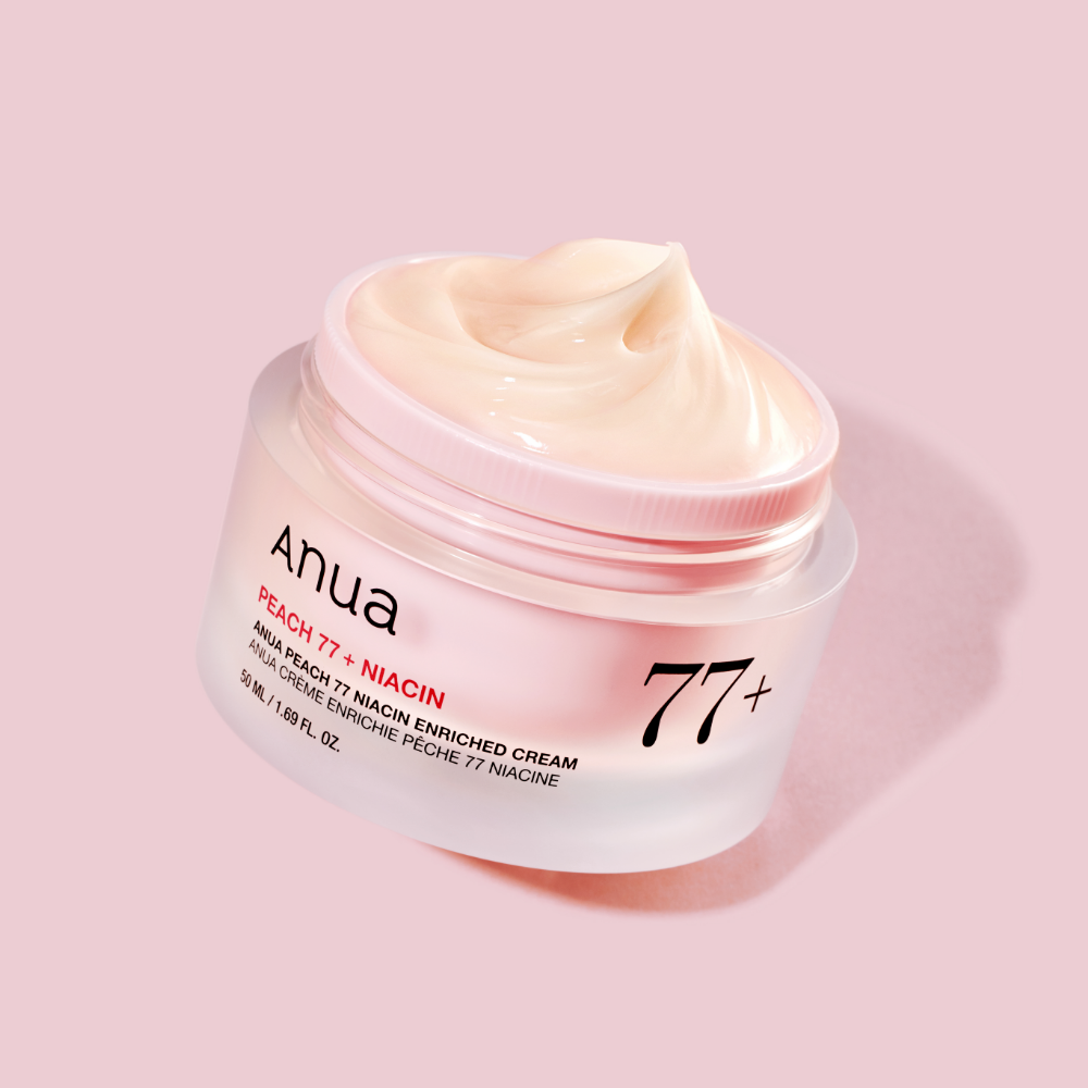 ANUA Peach 77 + Niacin Enriched Cream 50ml, crème Anua sur fond rose pastel, texture de crème ouverte (contexte visuel).