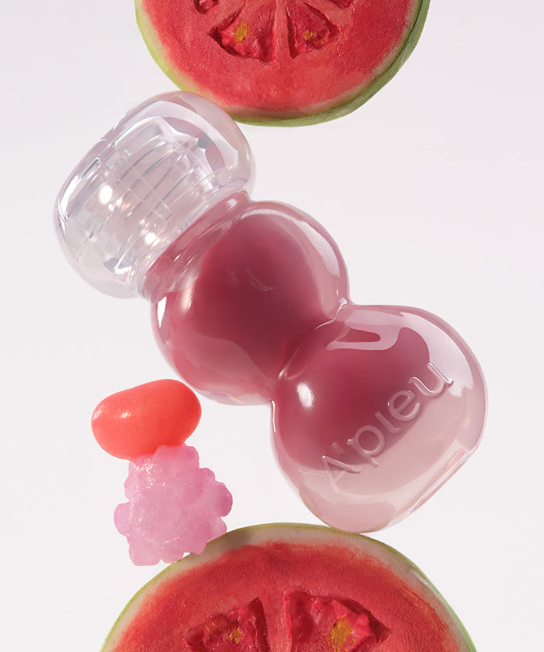 A'PIEU Jelly Tint (10 Colors) de la marque A'PIEU, sur fond clair, avec texture gel et fruits (pastèque, fraise).