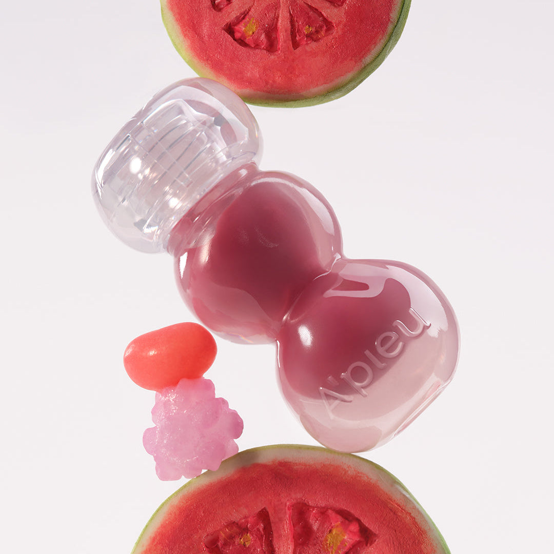 A'PIEU Jelly Tint (10 Colors) de la marque A'PIEU, sur fond clair, avec texture gel et fruits (pastèque, fraise).