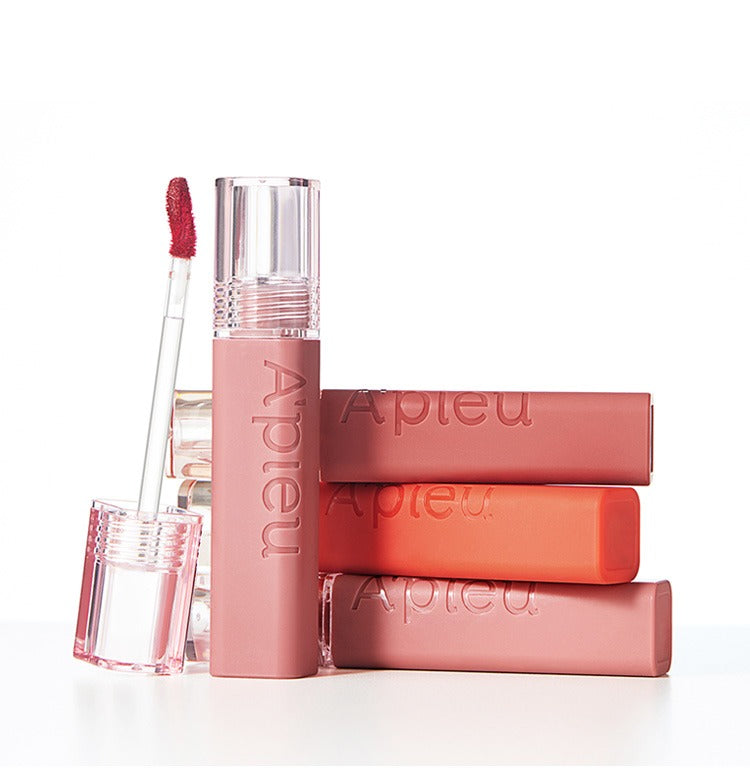 A'PIEU Juicy Pang Tint de la marque A'PIEU, gloss lèvres rouge sur fond blanc, packaging en vue produit.