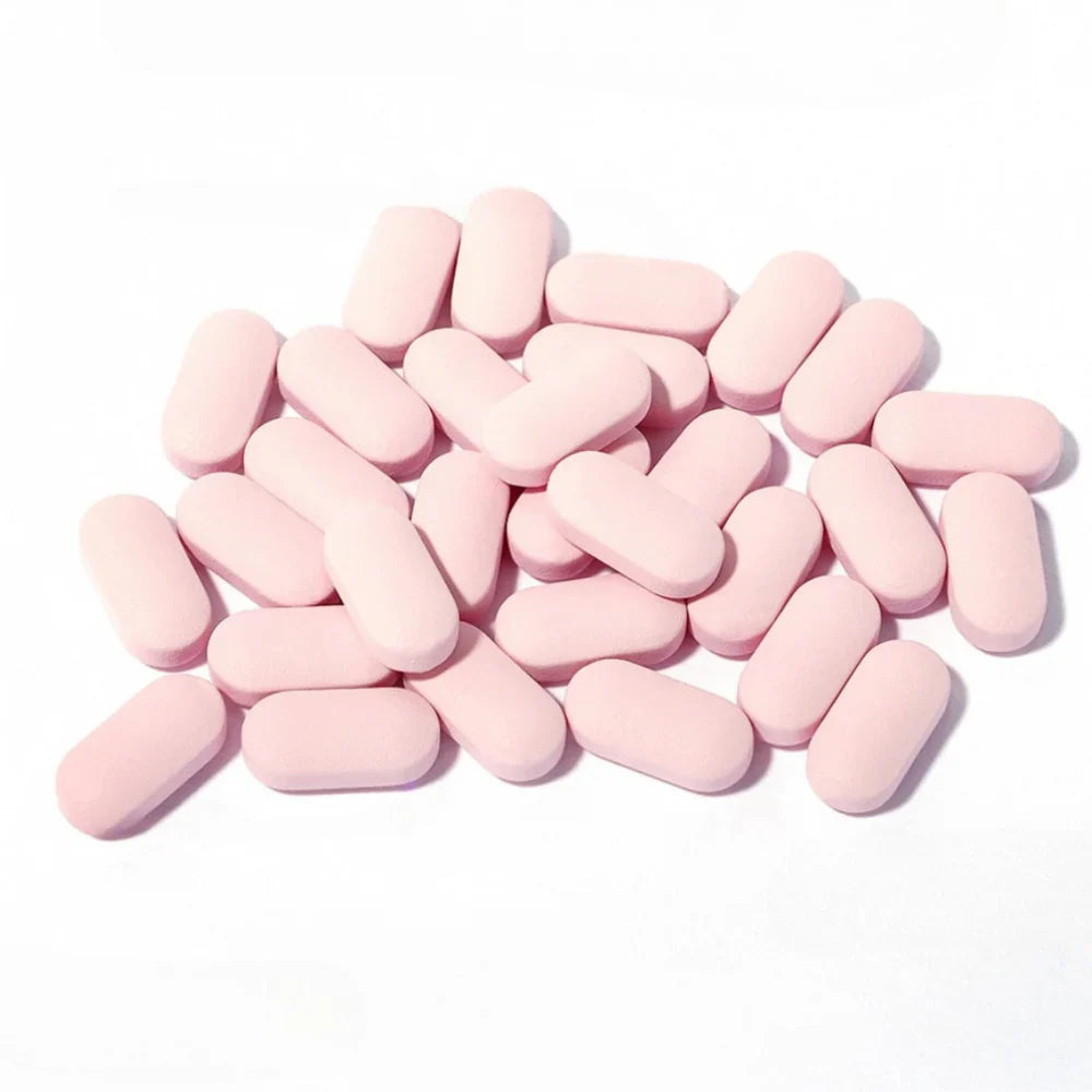 APLB Collagen Peptide Beauty Tablet de la marque APLB, comprimés roses sur fond blanc, contexte beauté/collagène