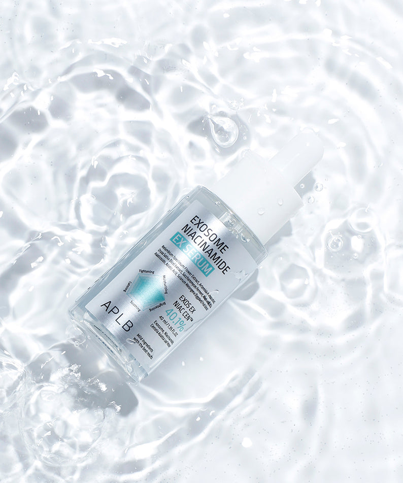 APLB Exosome Niacinamide EX Serum 40ml de la marque APLB, flacon sur fond blanc effet bulles, cosmétique visage.