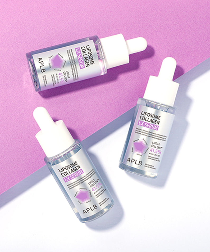 APLB Liposome Collagen LX Serum 40ml de la marque APLB, sérums en flacons sur fond rose et blanc, éclairage studio.