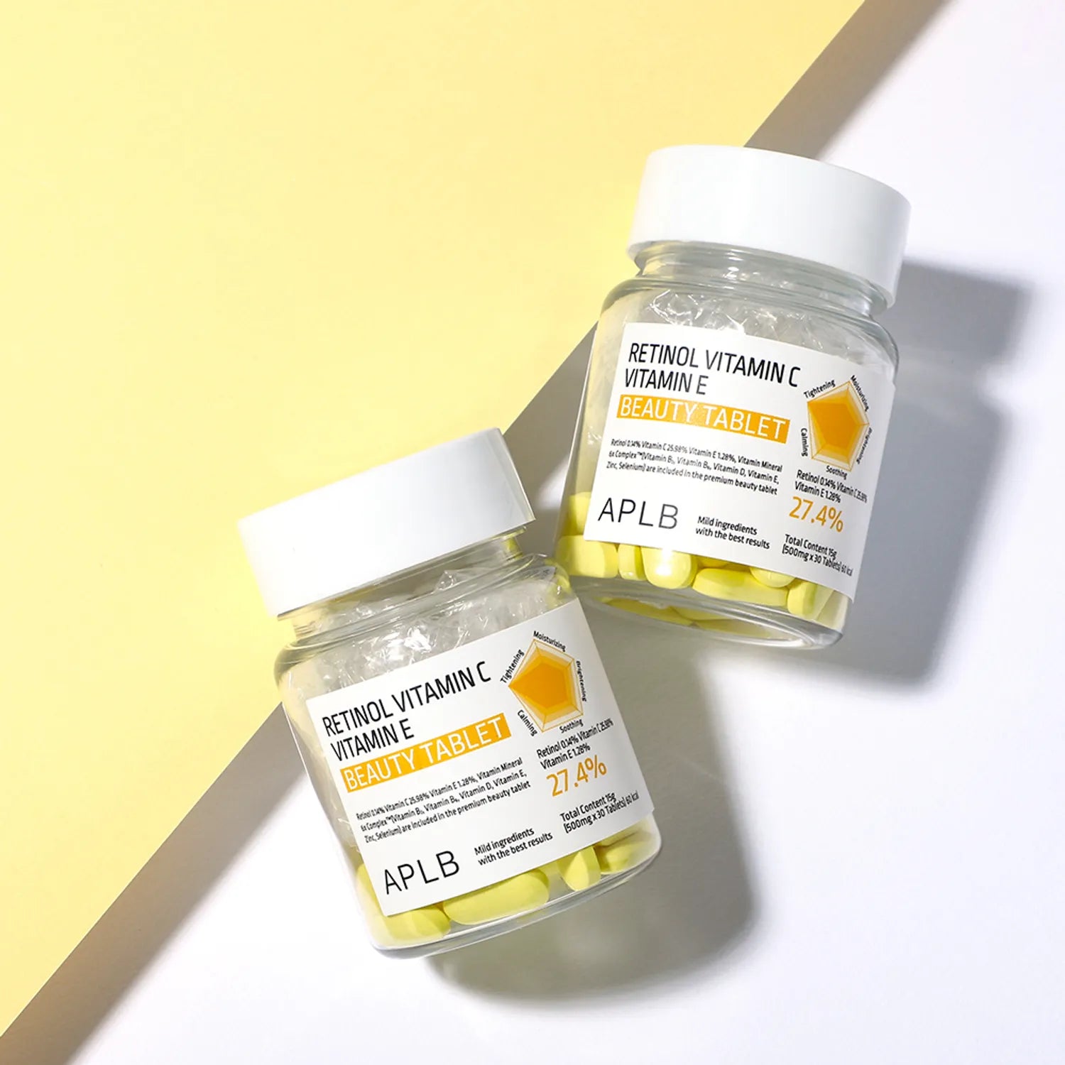 APL B Retinol Vitamin C Vitamin E Beauty Tablet de la marque APLB, flacons sur fond jaune avec lumière douce