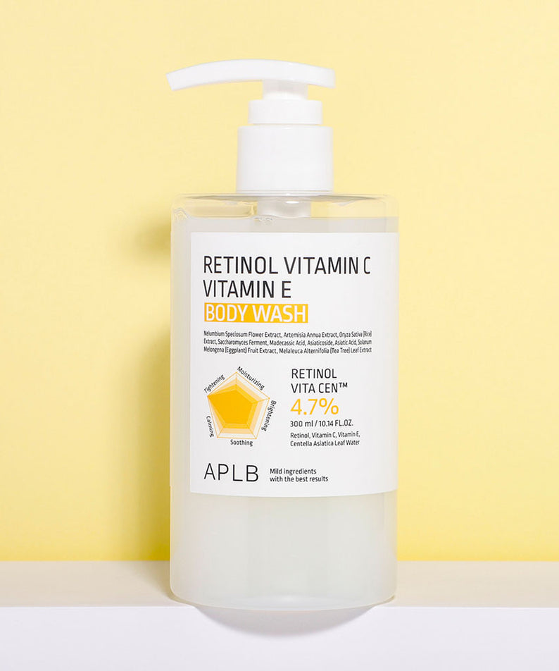 APL B Retinol Vitamin C Vitamin E Body Wash 300ml de la marque APLB sur fond jaune, flacon pompe blanc.