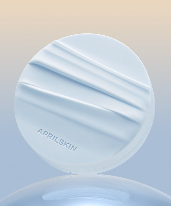 APRILSKIN Glowing Matt Cushion + Refill, fond de teint compact sur fond dégradé, idéal pour un teint lumineux et mat.