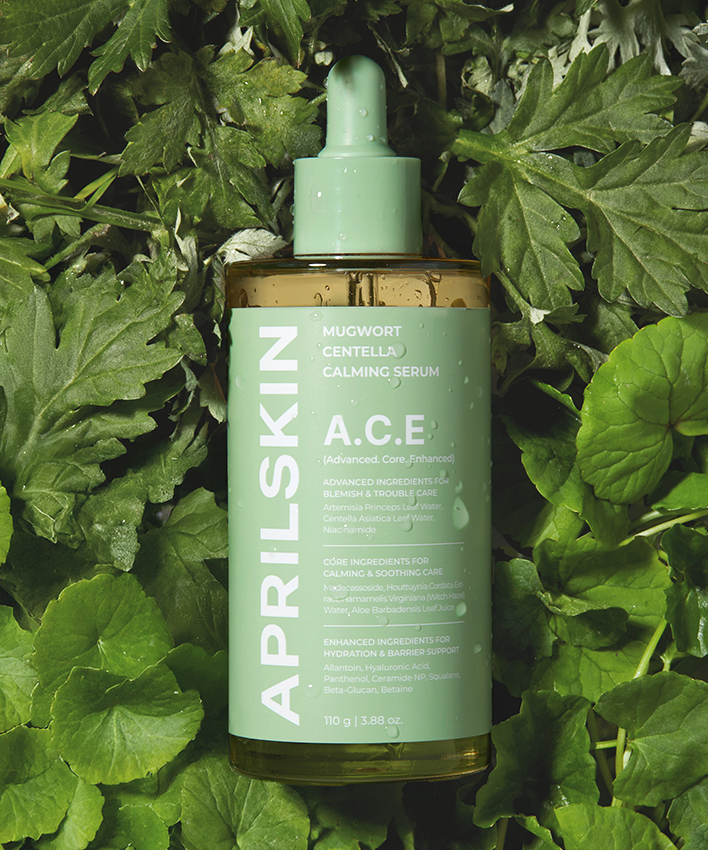 APRILSKIN Centella Calming Ampoule 110g de la marque APRILSKIN, flacon vert sur fond de feuilles de centella.