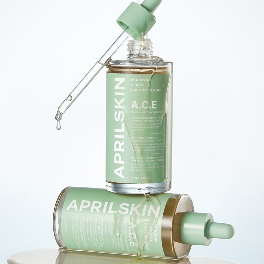 APRILSKIN Centella Calming Ampoule 110g, flacon vert avec goutte sur fond clair, marque APRILSKIN en contexte cosmétique