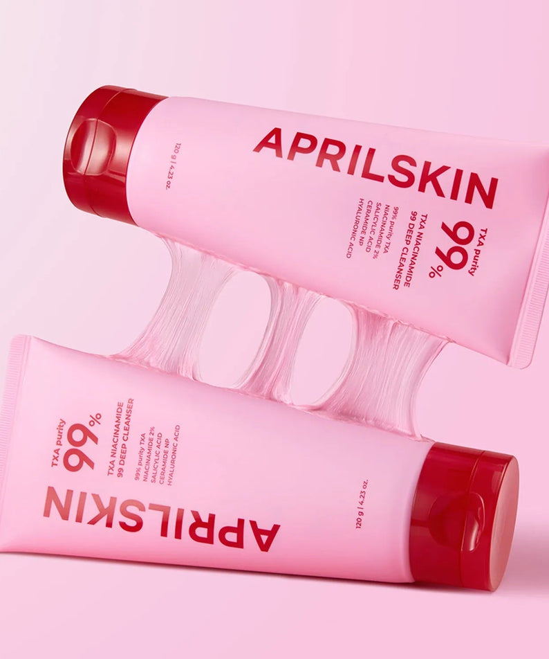 APRILSKIN TXA Niacinamide 99 Deep Cleanser 120g sur fond rose, pack et flacons visibles (marque APRILSKIN).
