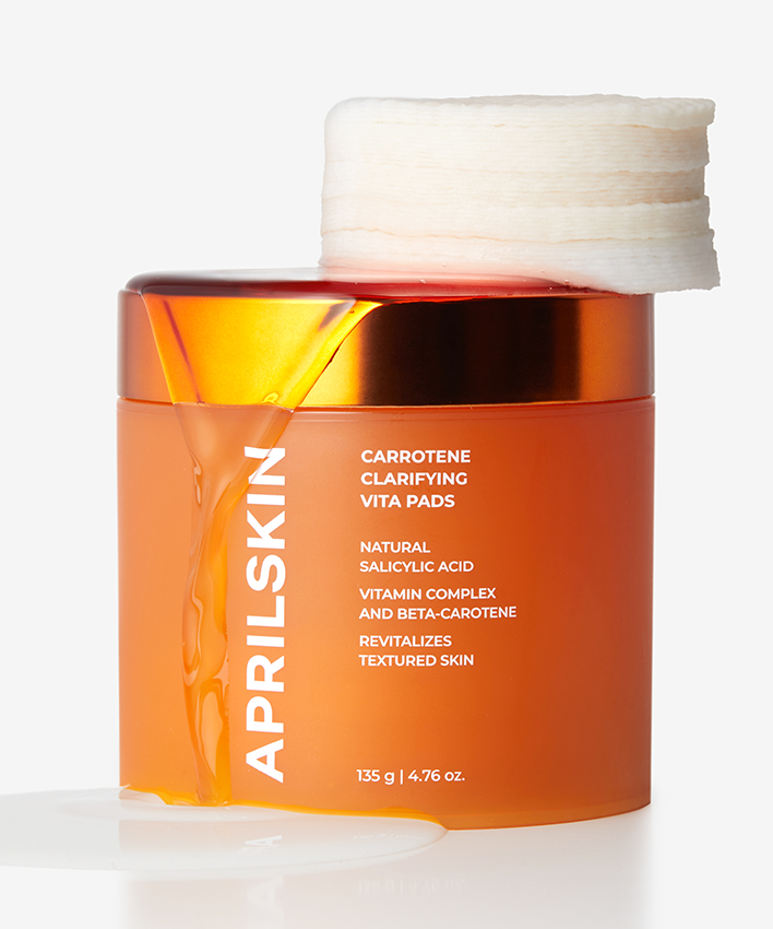 APRILSKIN Carrotene Clarifying Vita Pad de la marque APRILSKIN, pot orange avec tampons, fond clair, photo produit.