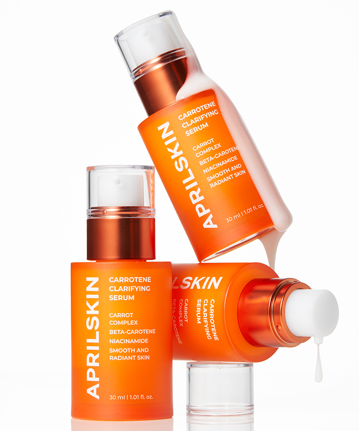 APRILSKIN Carrotene Clarifying Serum 30ml d’APRILSKIN, flacon orange sur fond blanc, goutte de sérum visible.