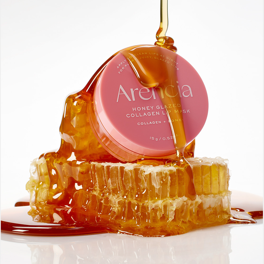ARENCIA  Honey Glazed Collagen Lip Mask 15g, pot rose avec miel doré sur fond blanc, texture glossy.