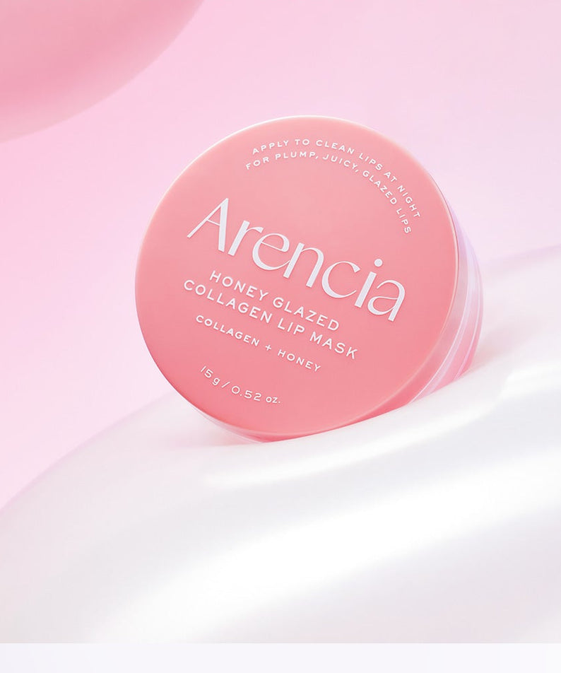ARENCIA  Honey Glazed Collagen Lip Mask 15g de la marque ARENCIA, pot rose sur fond rose pastel, look cosmétique