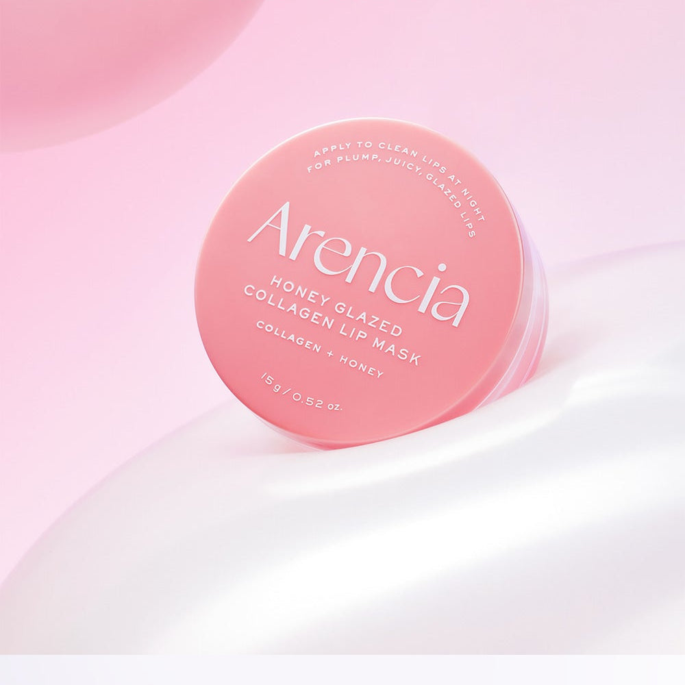 ARENCIA  Honey Glazed Collagen Lip Mask 15g de la marque ARENCIA, pot rose sur fond rose pastel, look cosmétique