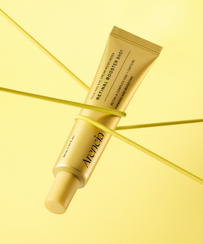 ARENCIA Retin-A Booster Shot 30ml, crème tube jaune sur fond jaune, visuel cosmétique moderne.