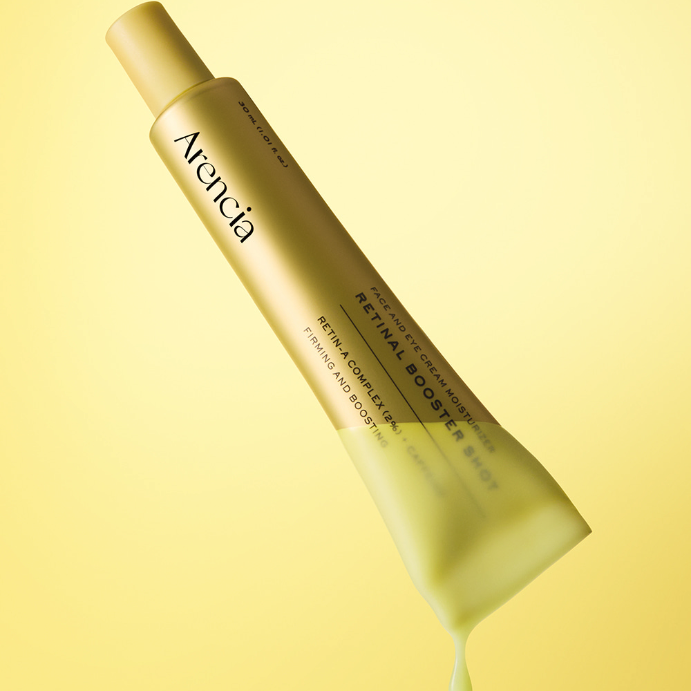 ARENCIA Retin-A Booster Shot 30ml, flacon doré sur fond jaune, mise en scène beauté, marque Arecia