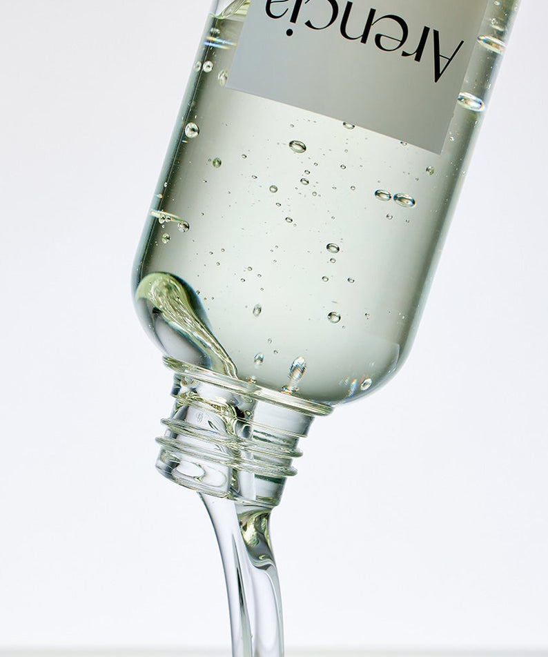 Flacon de ARENCIA Pore Melt Mochi Cleansing Oil 200ml versant de l'huile nettoyante transparente