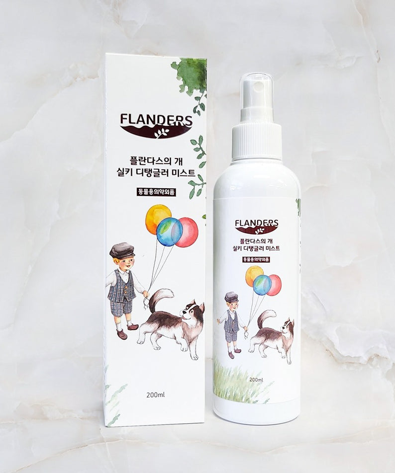 ATOMANDE Flander's Dog Silky Detangler Mist 200ml, vaporisateur illustré avec un chien et un garçon, pour soins capillaires chiens.
