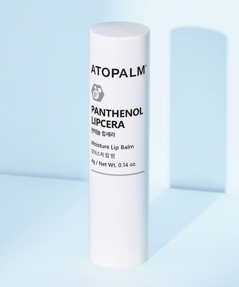 ATOPALM Panthenol Lipsera 4g en tube, baume à lèvres hydratant sur fond bleu