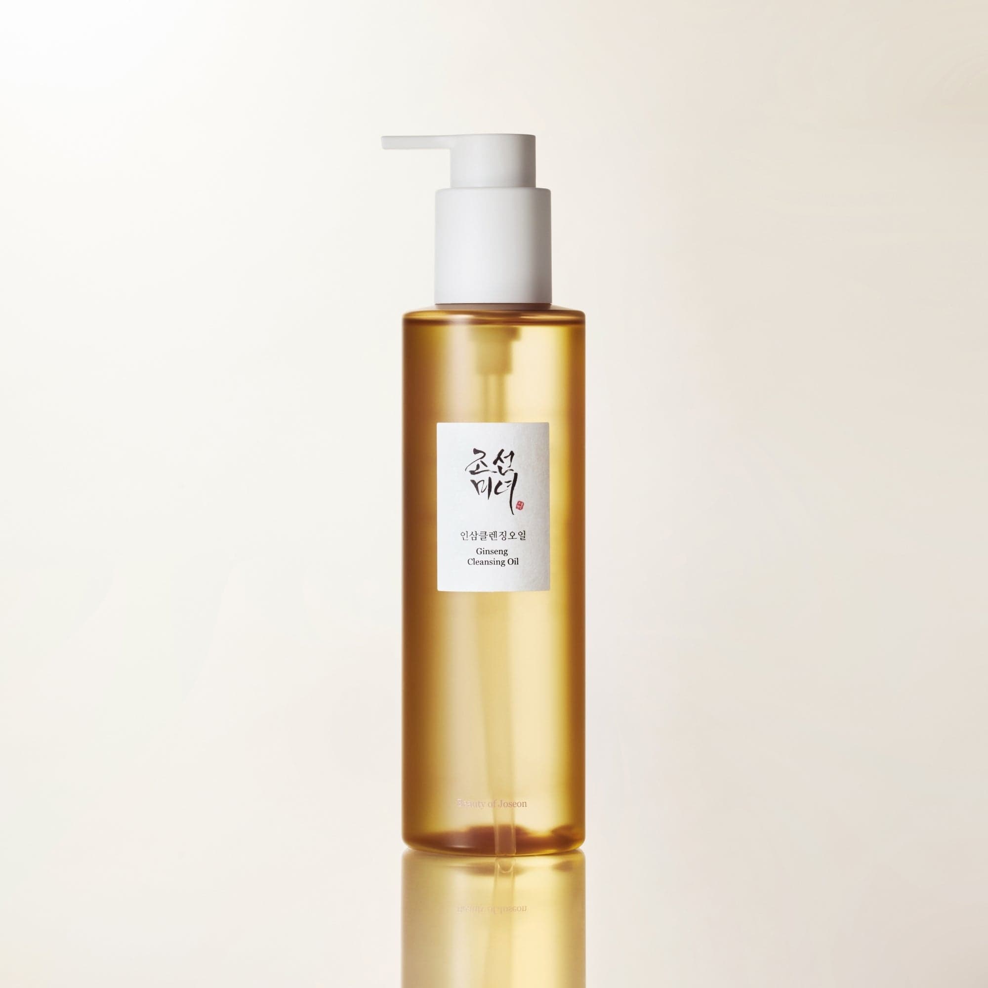 BEAUTY OF JOSEON Ginseng Cleansing Oil 210ml, flacon pompe en verre ambré sur fond clair, marque coréenne, soin visage
