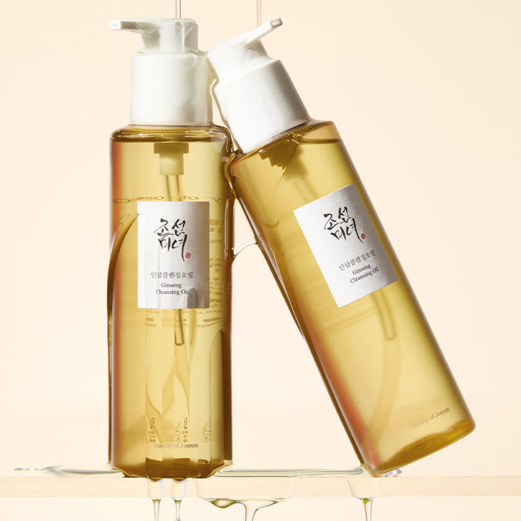 BEAUTY OF JOSEON Ginseng Cleansing Oil 210ml, flacons dorés sur fond crème, gouttes d’huile, ambiance soin visage