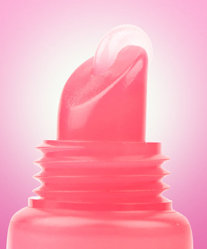 BARULAB Collagen Caffeine Tangle Lip Serum 10g : tube et embout en gros plan sur fond rose, marque BARULAB