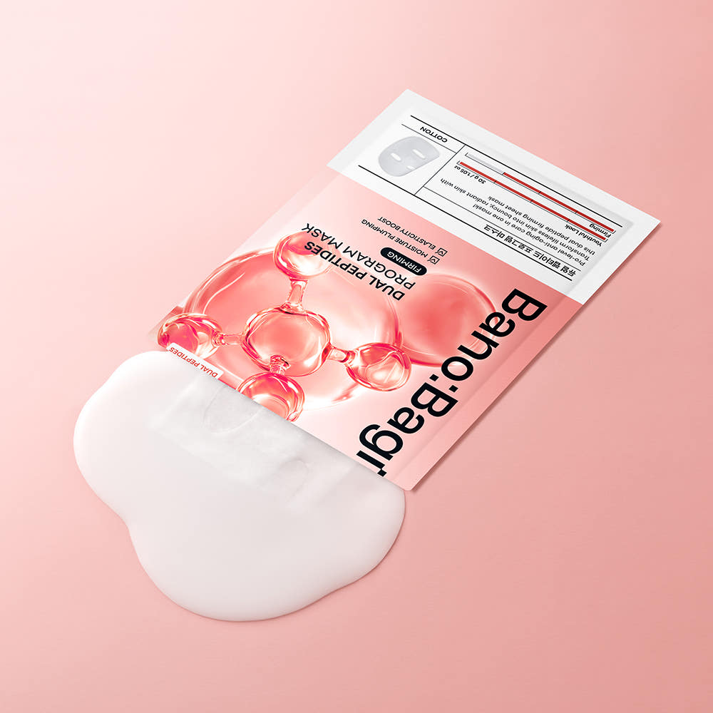 BANOBAGI Baby Face Injection Mask de la marque Banobagi, masque facial sur fond rose pastel, packaging visible en détail.