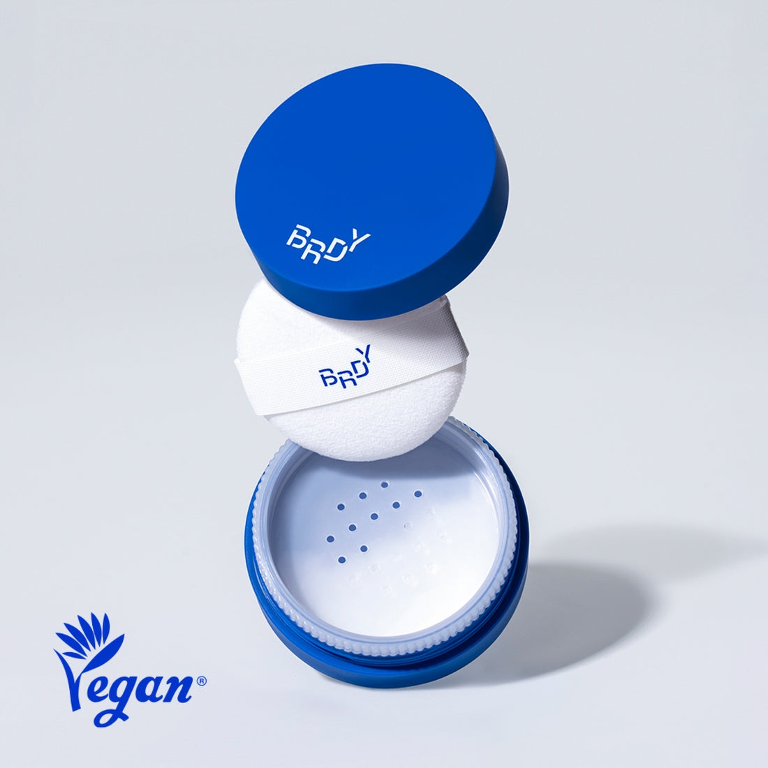 Poudre de sebum BE.READY Blue Sebum Powder 7g, boîte ouverte, étiquette vegan visible.