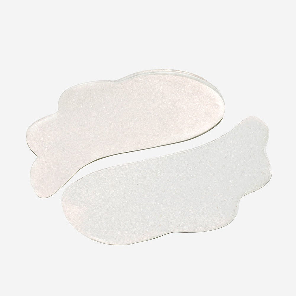 BEAUTY OF JOSEON Ginseng Retinal Elasticity Eye Patch 60 Sheets, patchs sous les yeux, texture blanc nacré, fond clair.