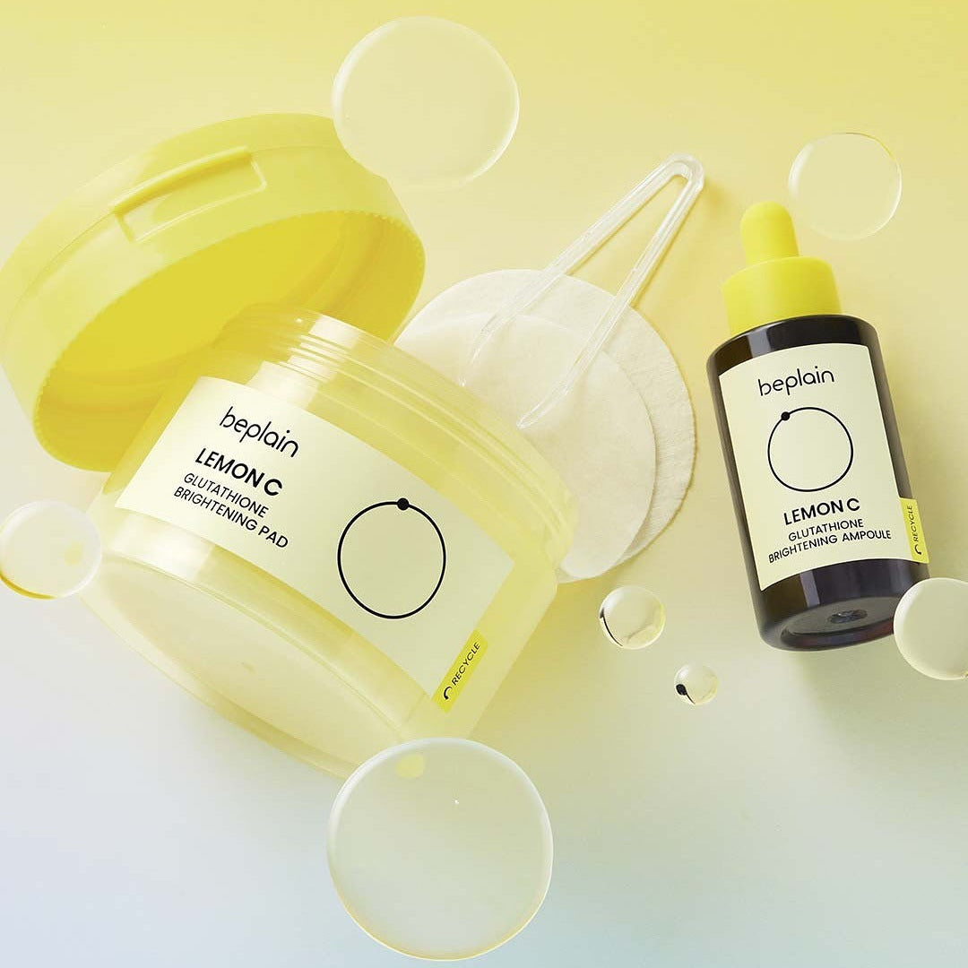 BEPLAIN Lemon Seed Glutathione  Brightening Pads 70 Sheets de beplain, pack citron et capsules sur fond jaune clair.